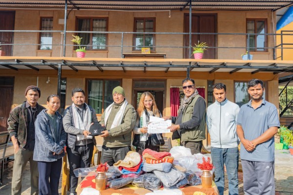 Warm hats distributed by Magar at Jhapa Service Center